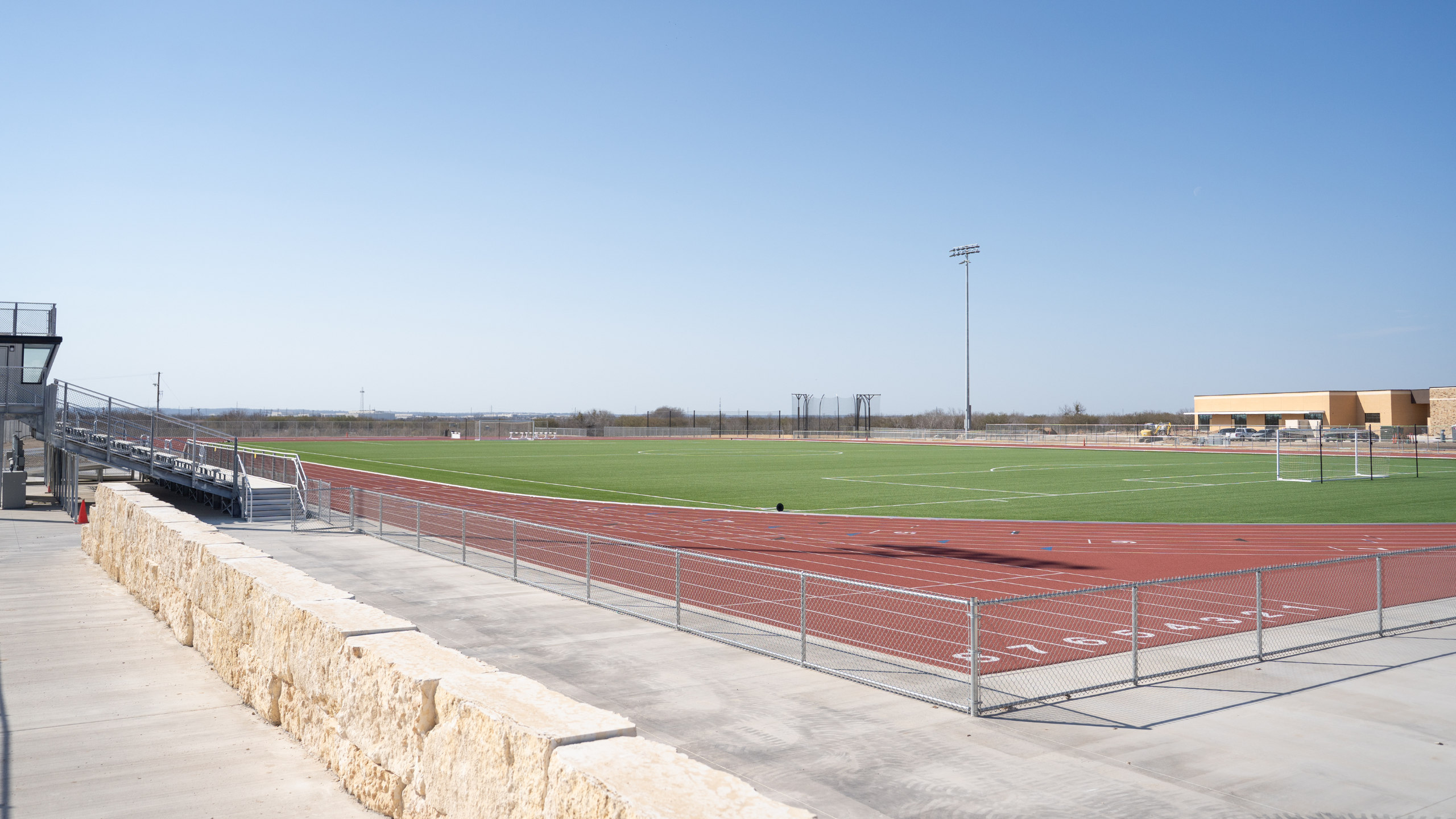 Tamusa's Track and Field facility viewed from the starting blocks of the Track.
